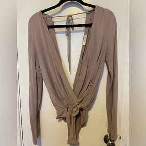 Women’s taupe bodysuit.